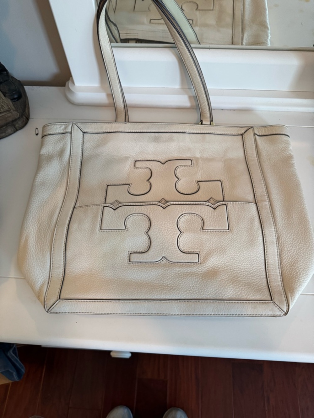Tory Burch Cream Leather Logo Tote with Contrast Stitching. Lt stain on front.